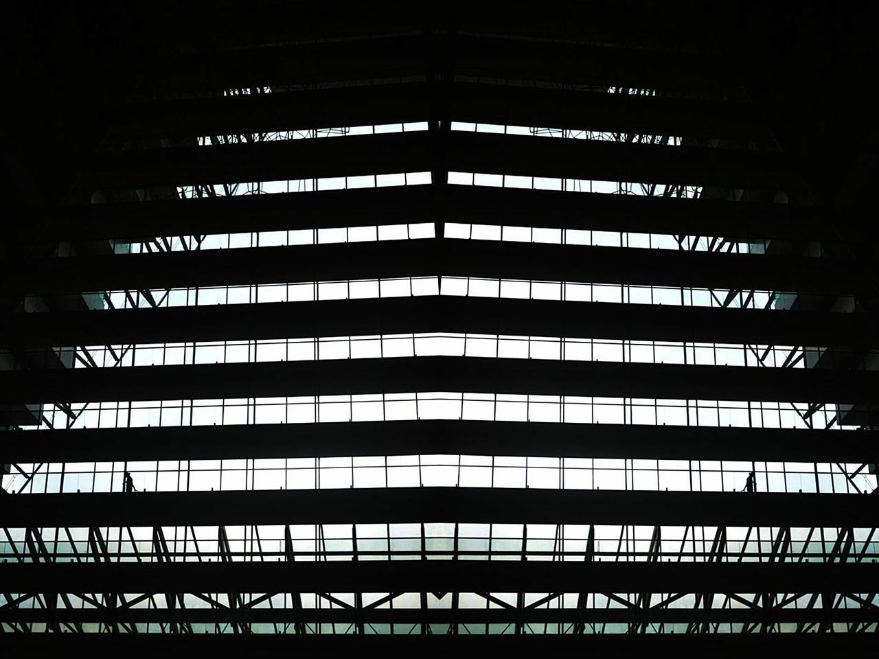 Low angle view of illuminated built structure at night