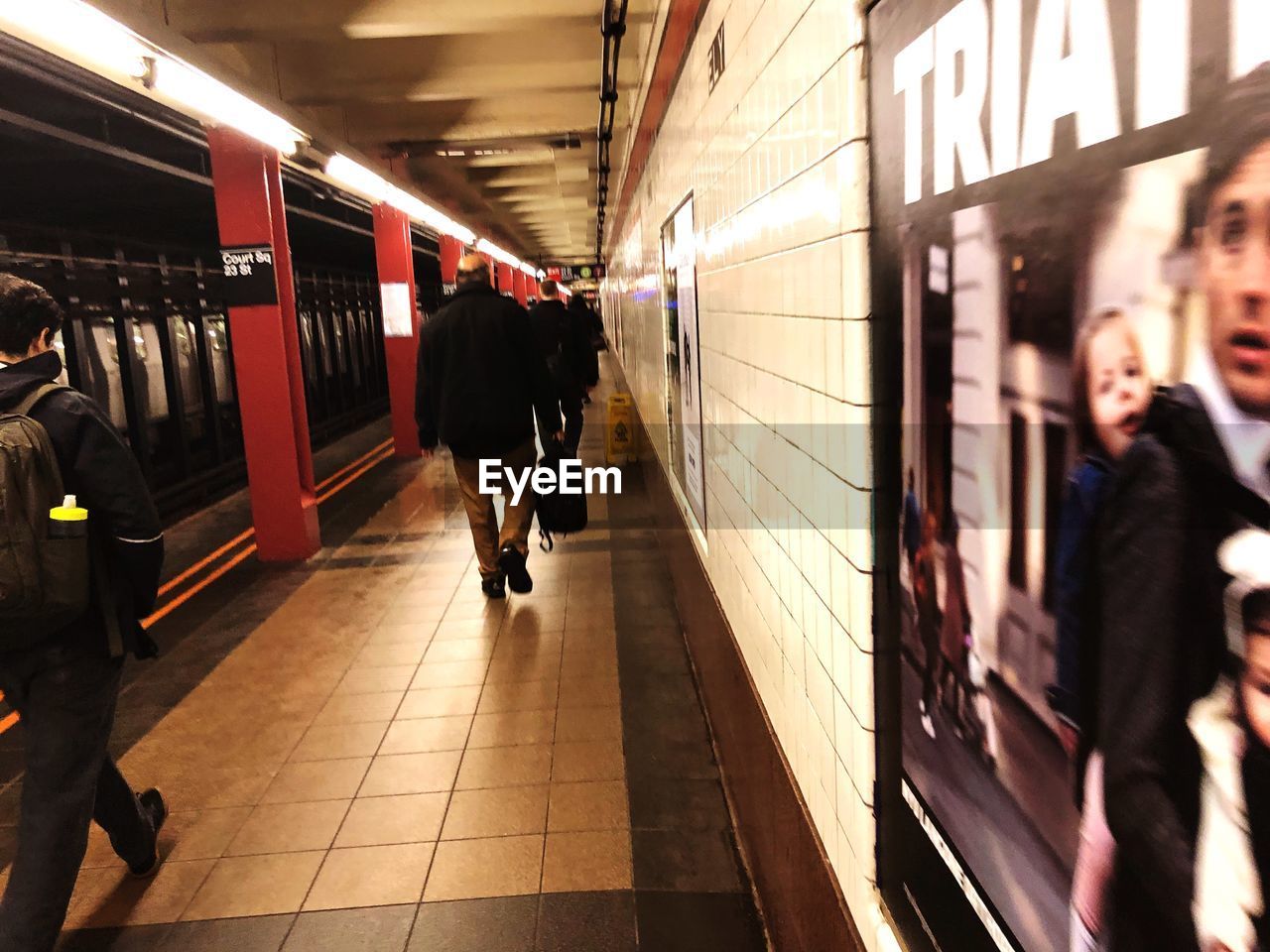 PEOPLE ON SUBWAY STATION