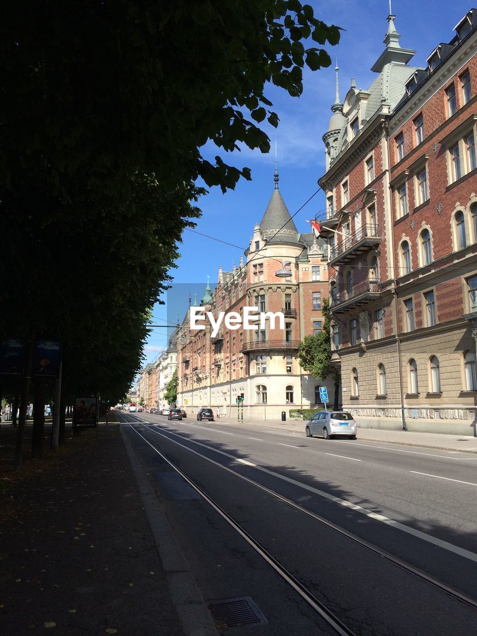 VIEW OF ROAD ALONG BUILDINGS