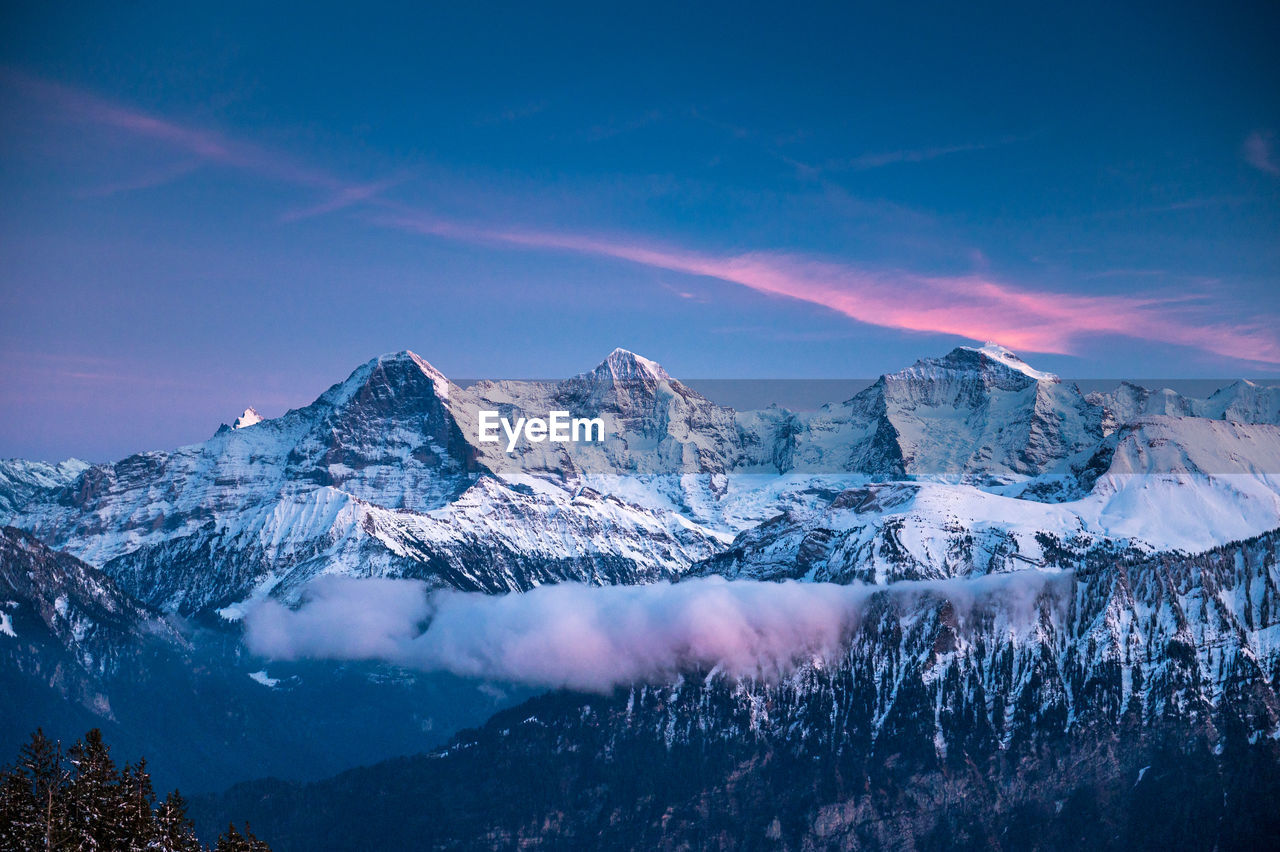 Scenic view of snowcapped mountains