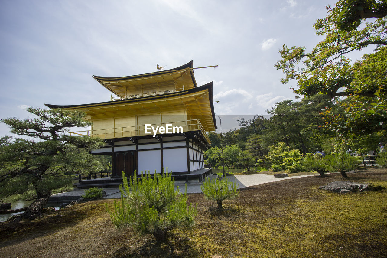 VIEW OF TEMPLE AGAINST BUILDING