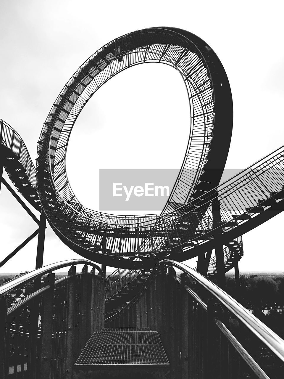 LOW ANGLE VIEW OF ROLLERCOASTER AGAINST SKY