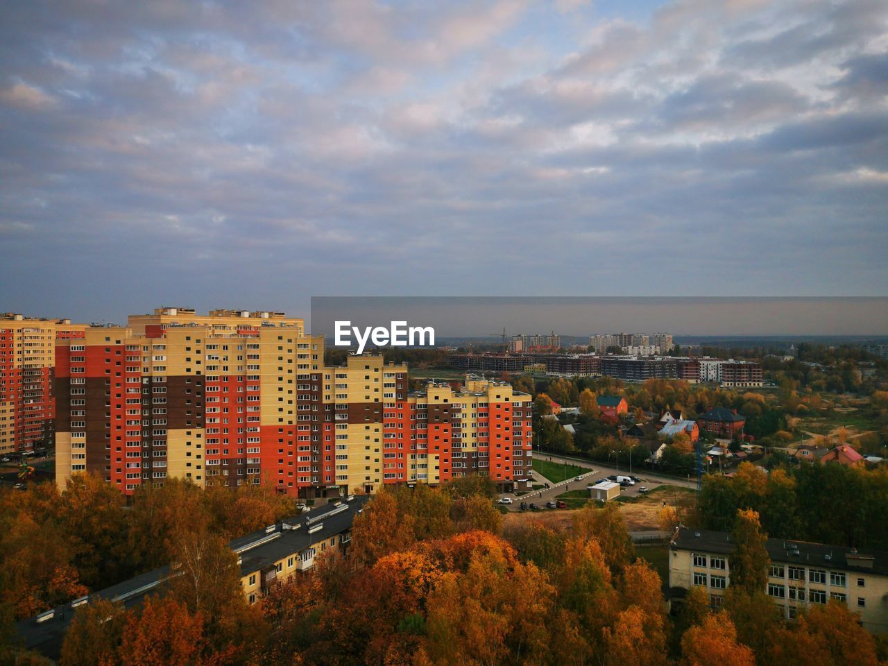 High angle view of buildings in city against sky
