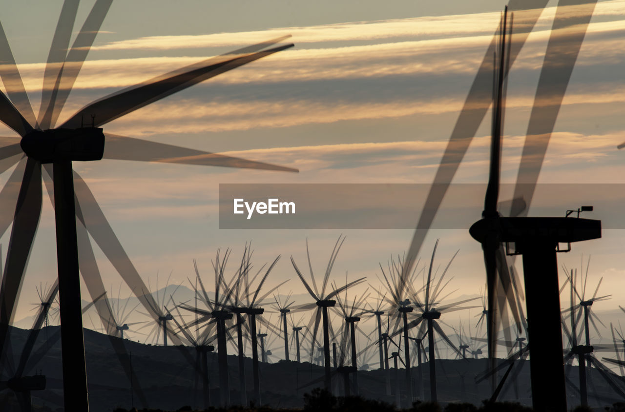 Windmills dot the california mountainside near mojave desert