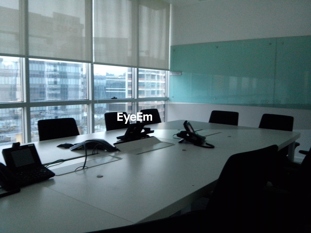 CHAIRS AND TABLES IN MODERN BUILDING