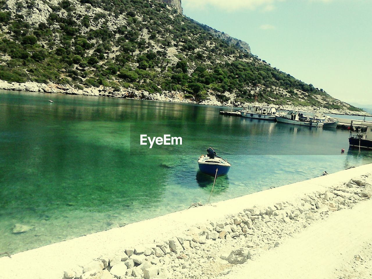 VIEW OF BOATS IN SEA