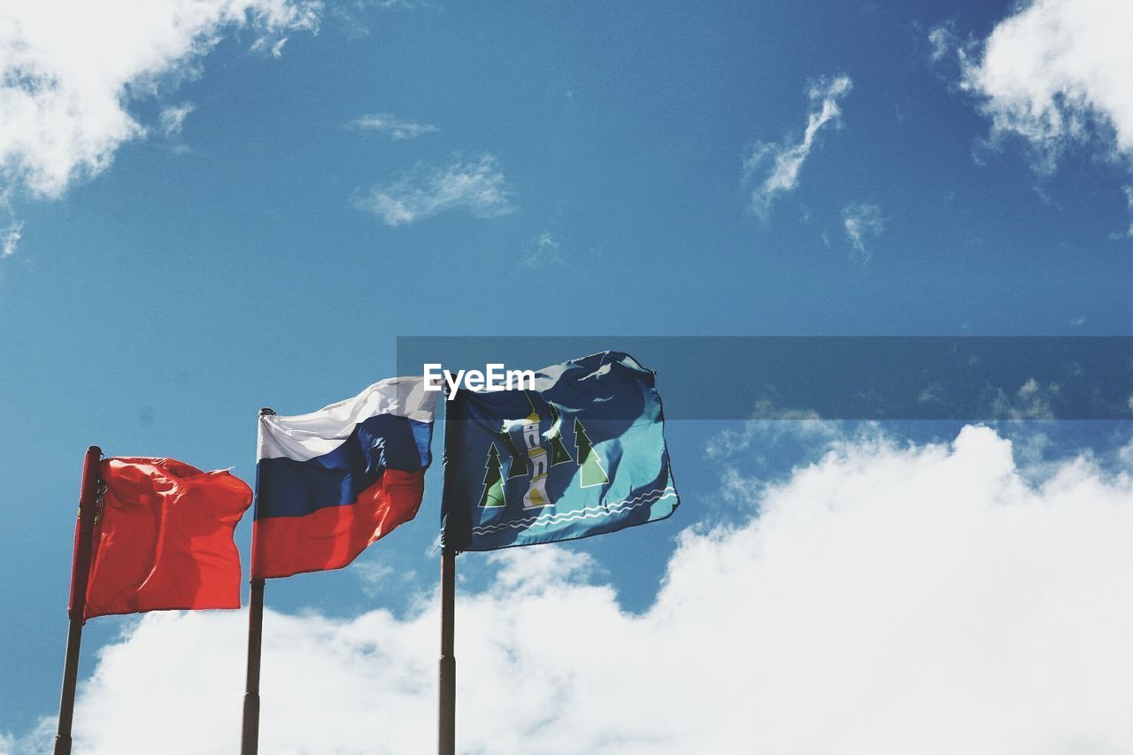 Low angle view of russian flag against sky