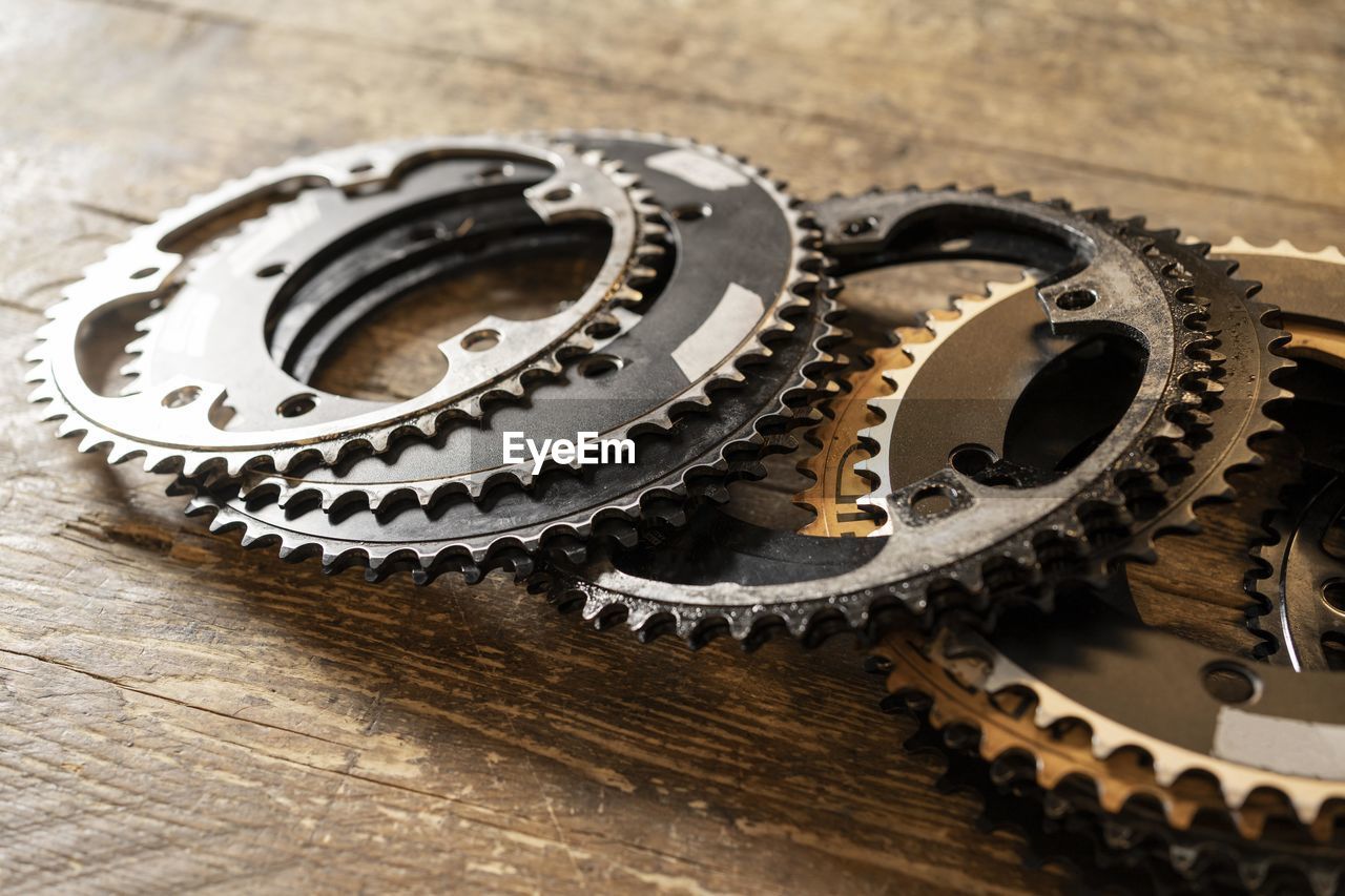 Close-up of gears on table