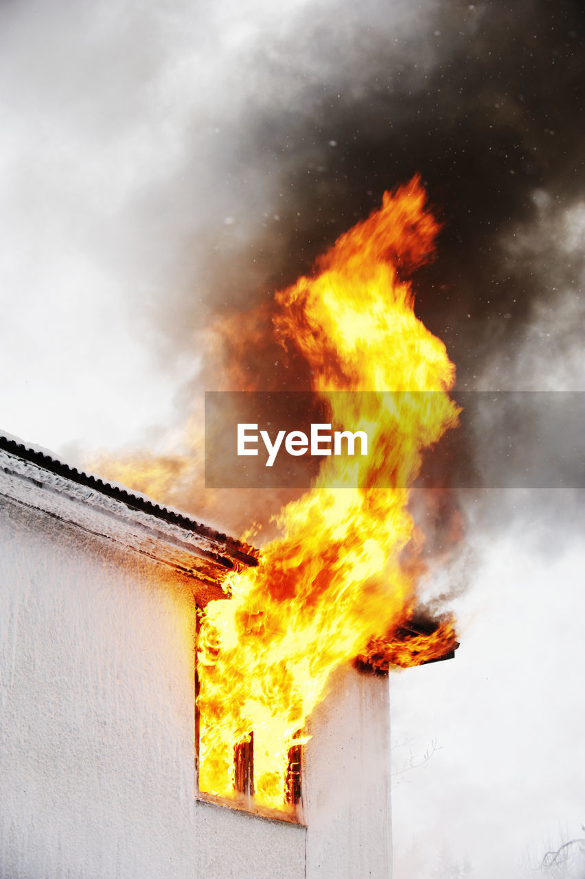 Flames coming out of window