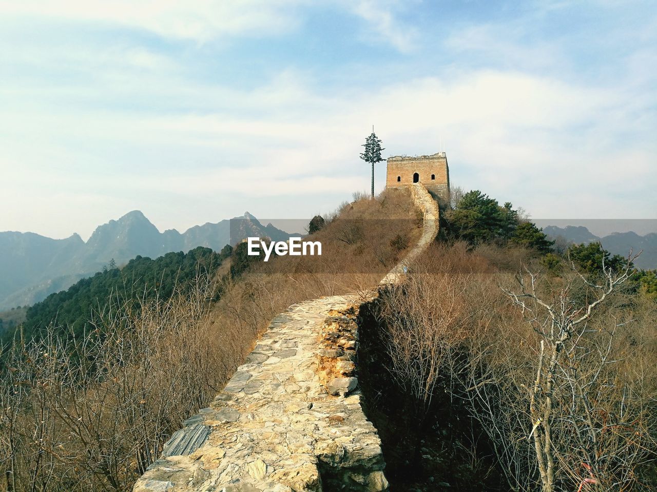 View of fort on mountain against cloudy sky