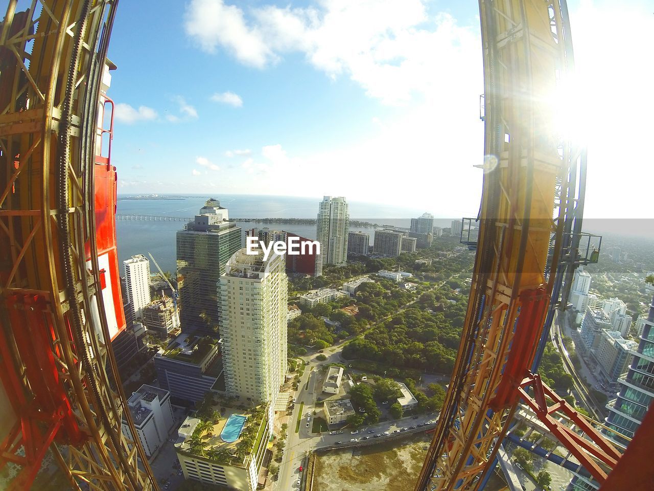 VIEW OF CITYSCAPE WITH SEA IN BACKGROUND