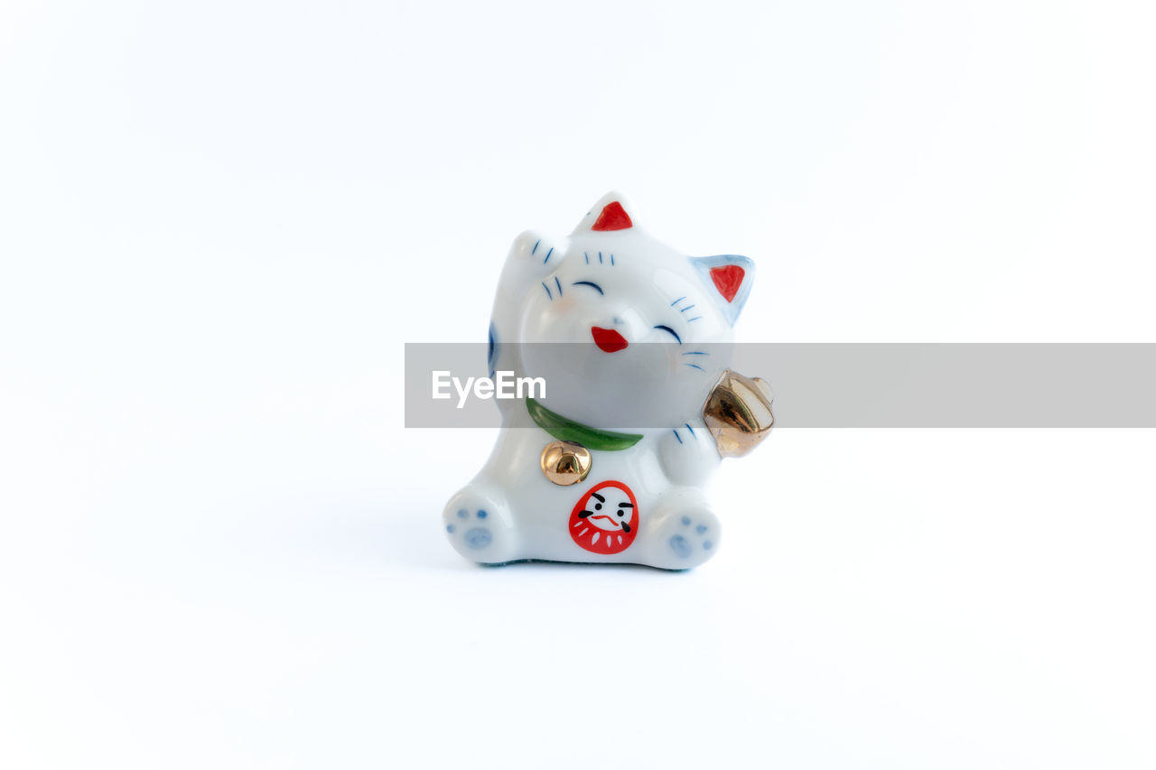 cartoon, studio shot, figurine, white background, representation, copy space, no people, toy, cut out, animal representation, indoors, piggy bank, white, animal, mammal, finance, single object, savings, human representation