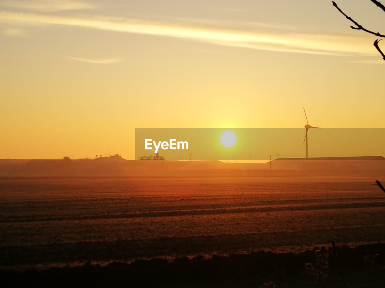 VIEW OF FIELD AGAINST SKY DURING SUNSET