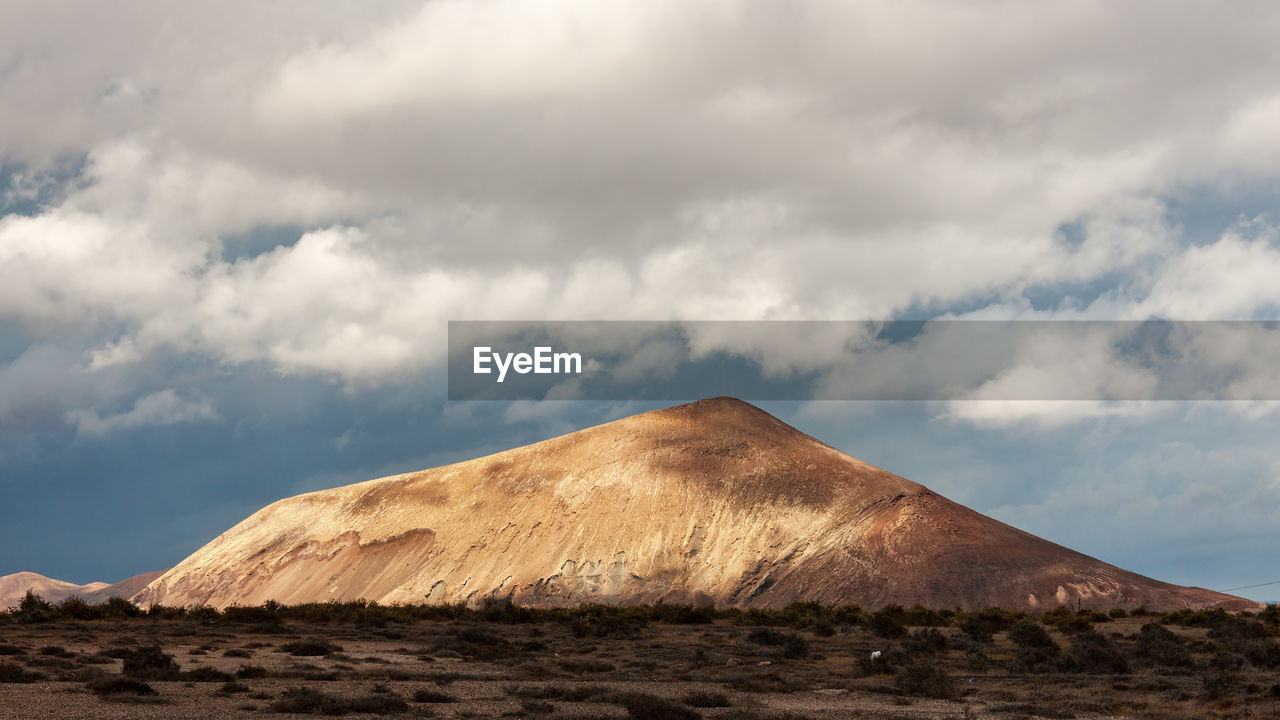 Scenic view of desert against sky