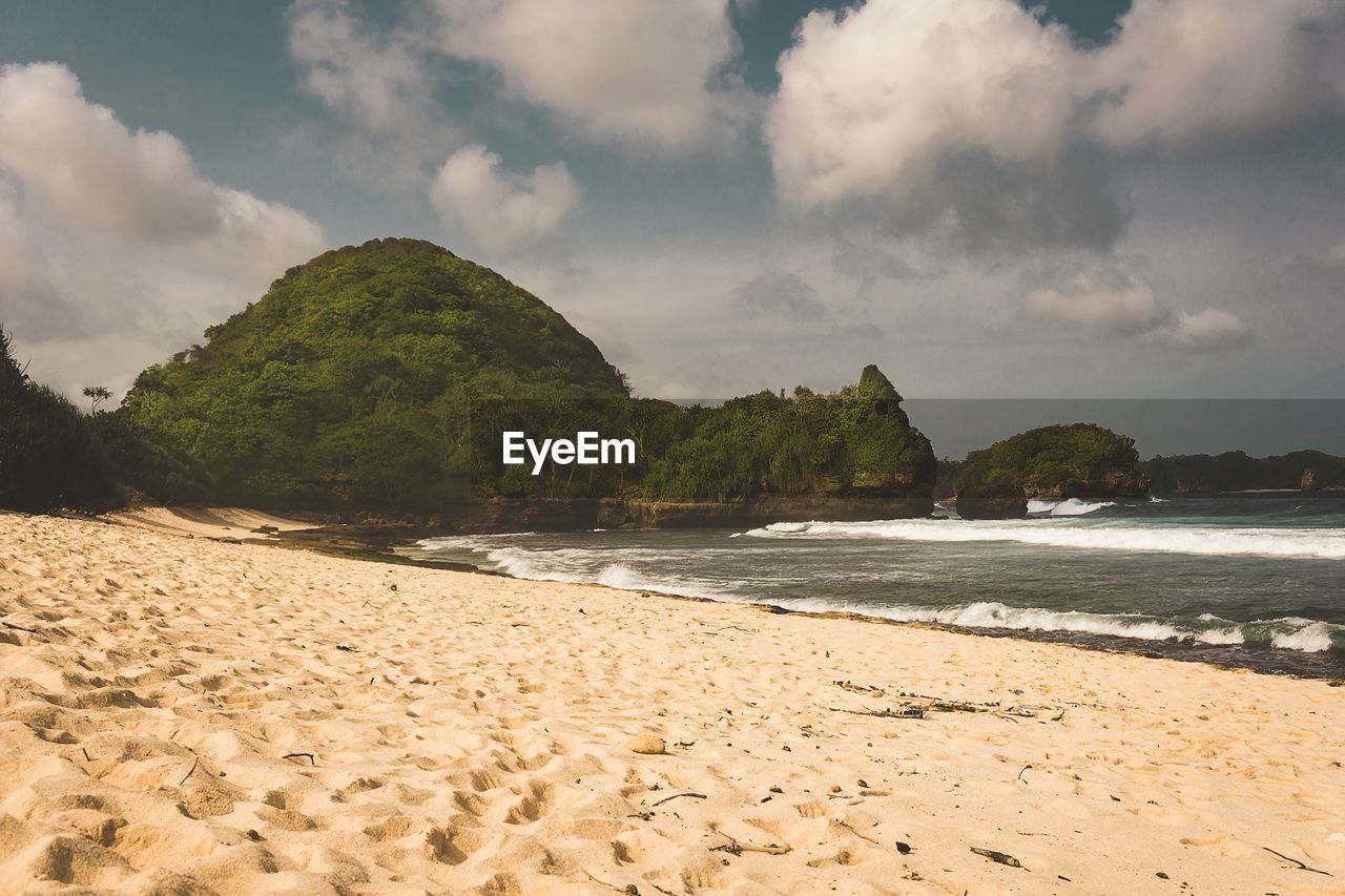 Scenic view of beach against sky