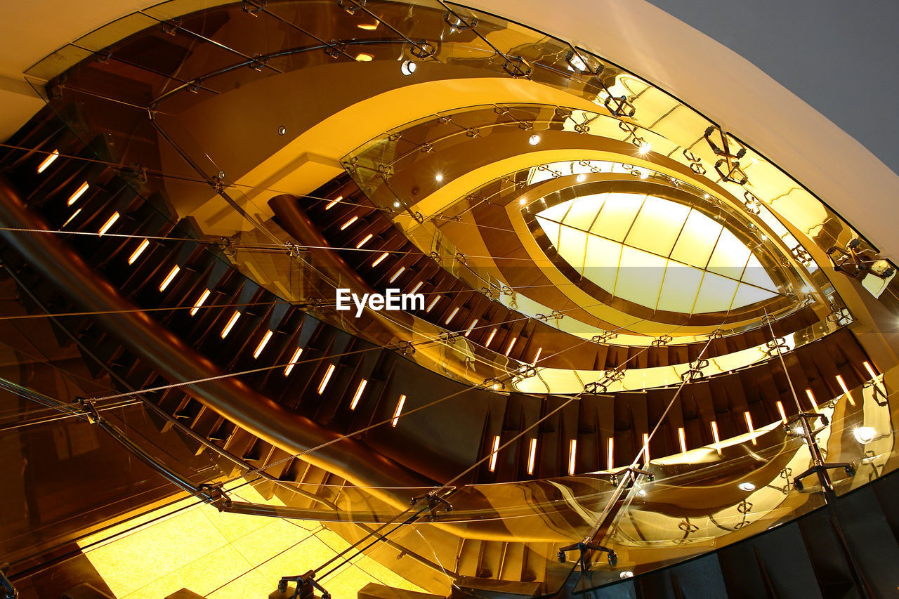 LOW ANGLE VIEW OF SPIRAL STAIRCASE OF BUILDING