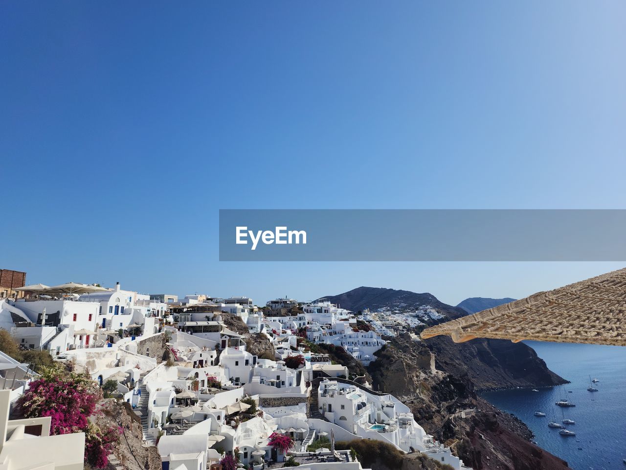 townscape against clear blue sky