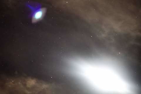 LOW ANGLE VIEW OF MOON IN SKY