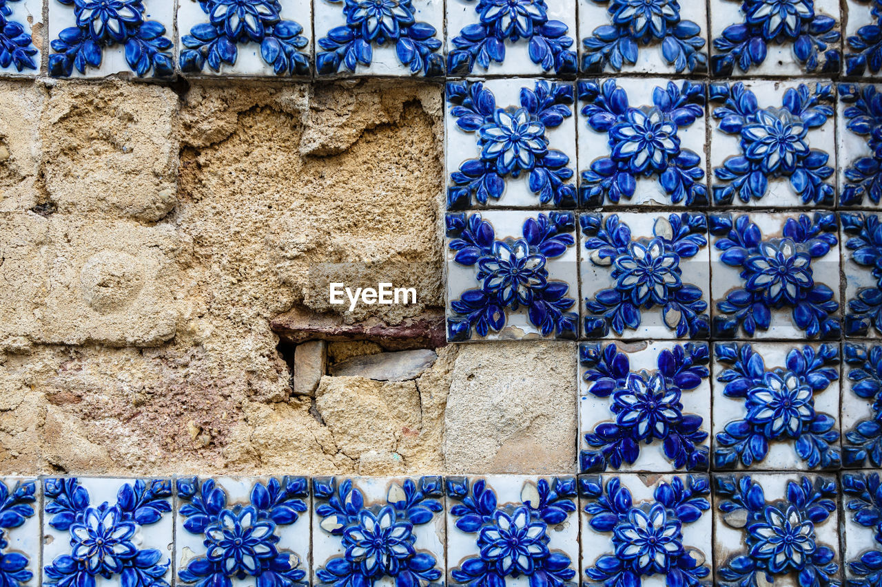 blue, built structure, architecture, no people, wall - building feature, day, pattern, wall, building exterior, full frame, backgrounds, low angle view, art, outdoors, building, window, nature, metal, close-up