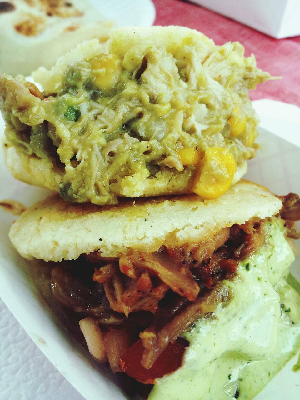 Close-up of various sandwich served in plate on table