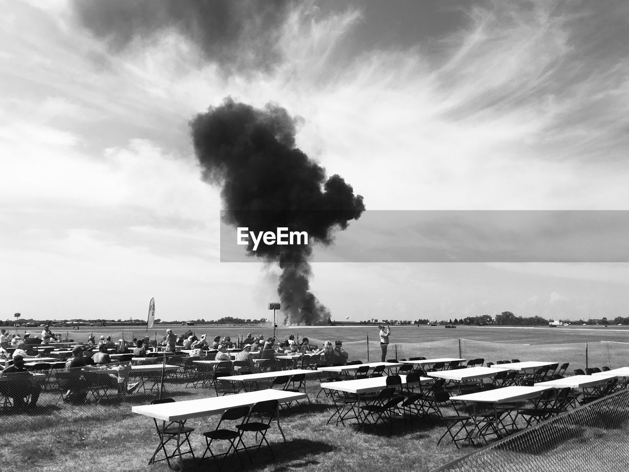 SMOKE EMITTING FROM CHIMNEY ON LAND