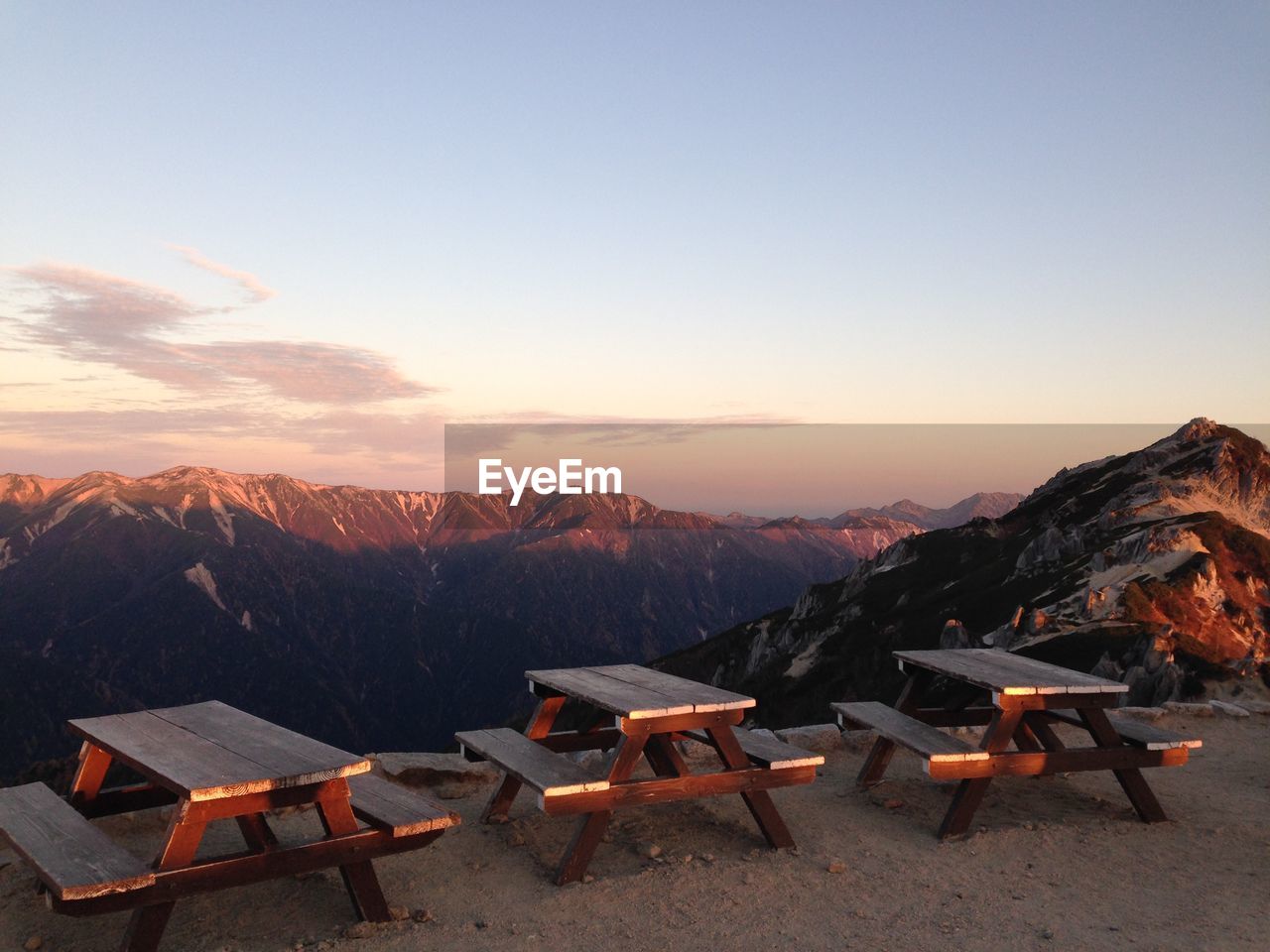 Scenic view of mountains against sky during sunset