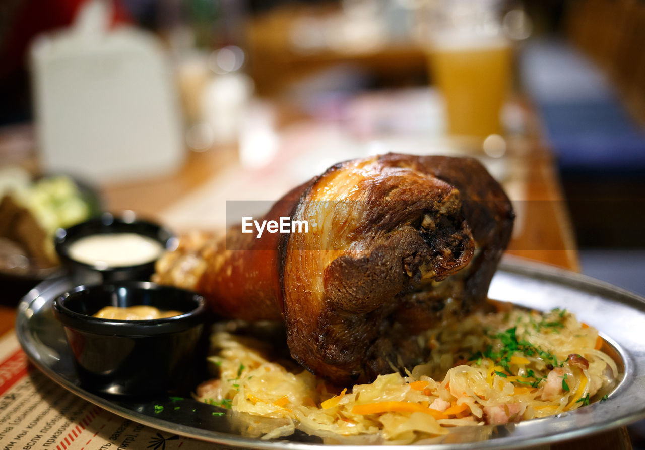 CLOSE-UP OF MEAL SERVED ON TABLE