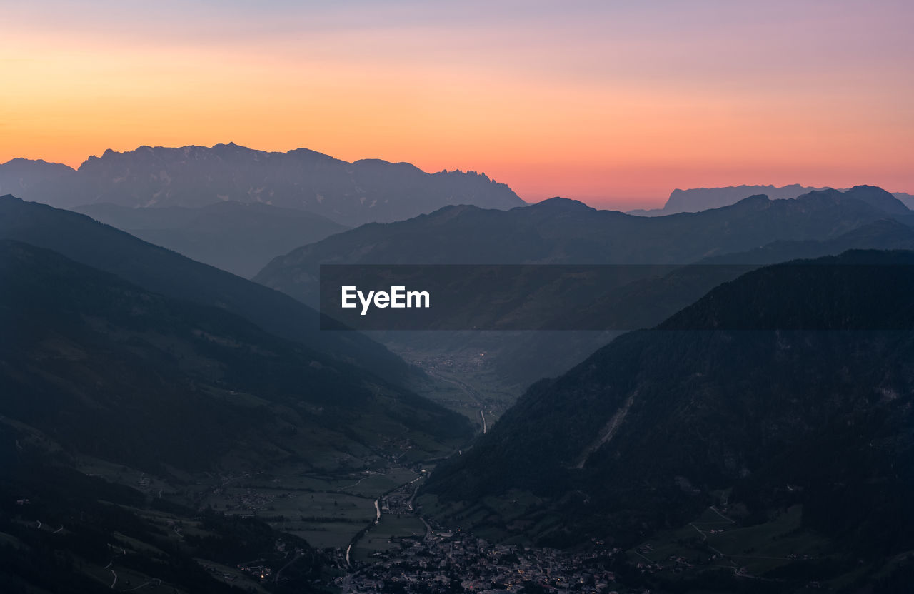 Scenic view of mountains against sky during sunset