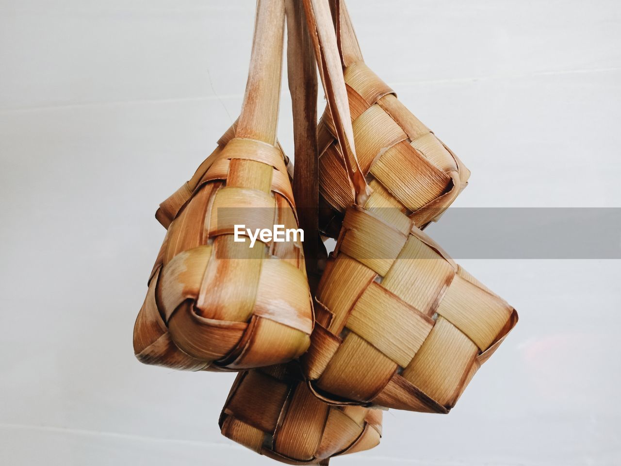 HIGH ANGLE VIEW OF SHOES AGAINST WHITE BACKGROUND