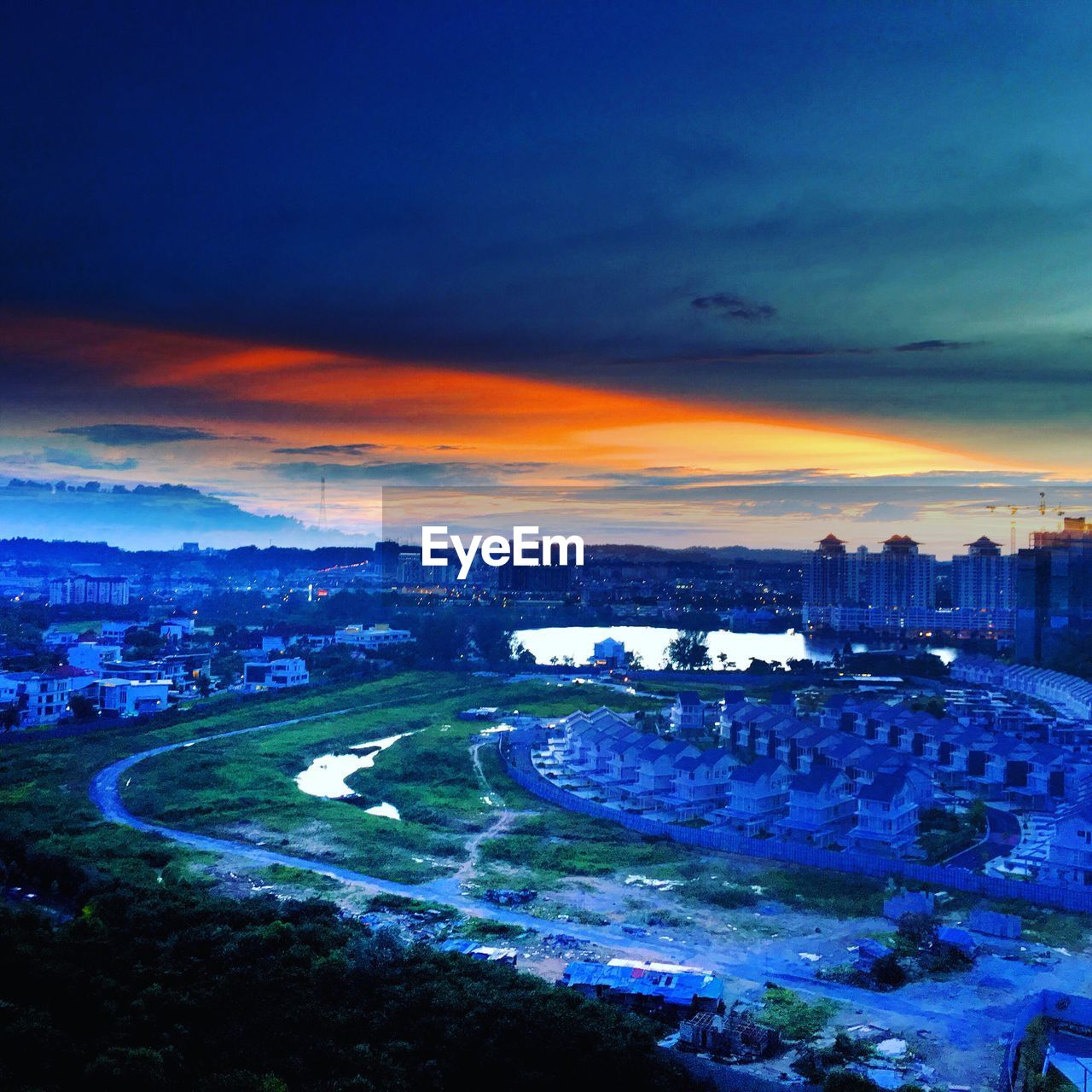 AERIAL VIEW OF CITY AT SUNSET