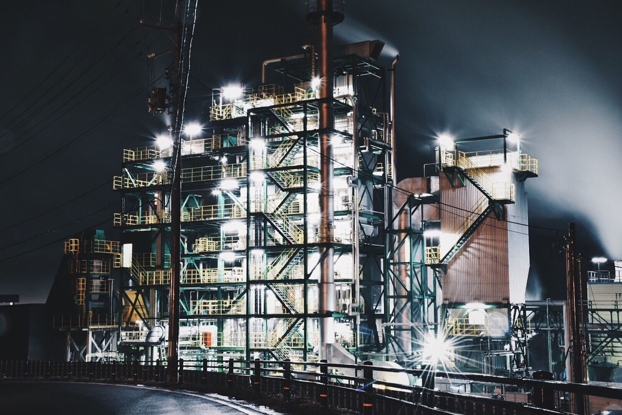 ILLUMINATED BRIDGE AT NIGHT