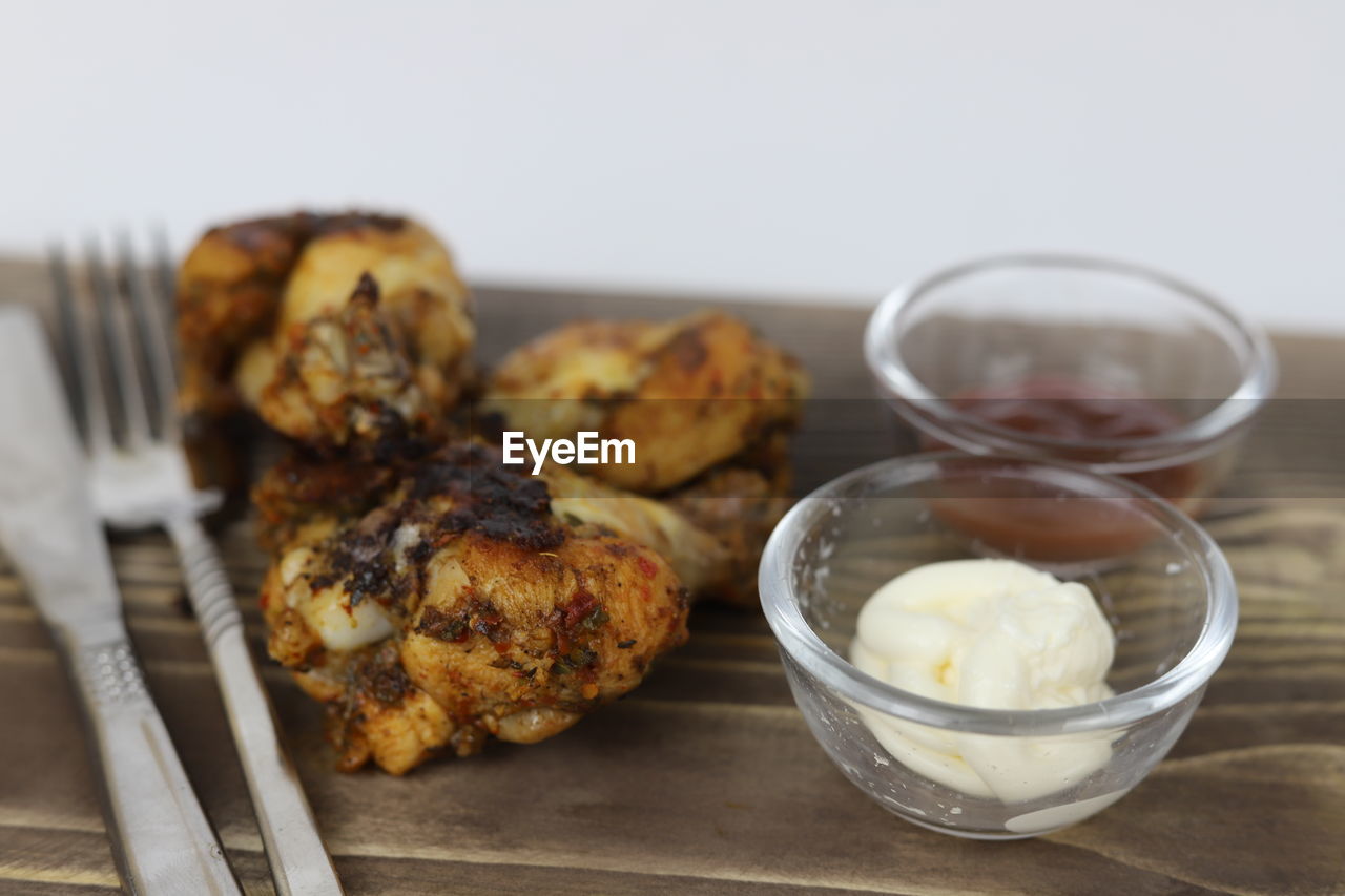 food and drink, food, dish, freshness, produce, breakfast, healthy eating, dessert, meal, indoors, no people, studio shot, wellbeing, fried food, baked, eating utensil, meat, close-up, wood, kitchen utensil, cuisine, focus on foreground, household equipment, vegetable, table