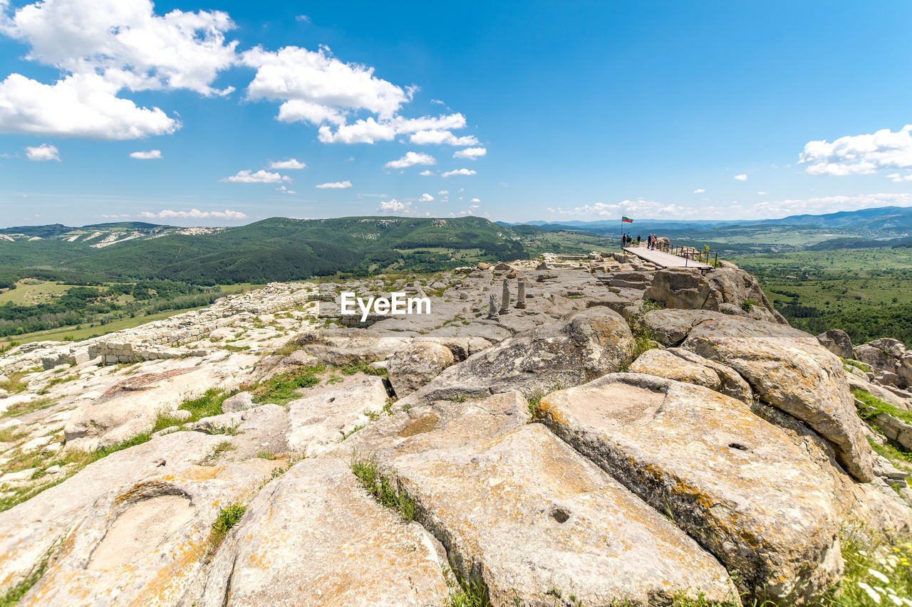 SCENIC VIEW OF ROCK AGAINST SKY