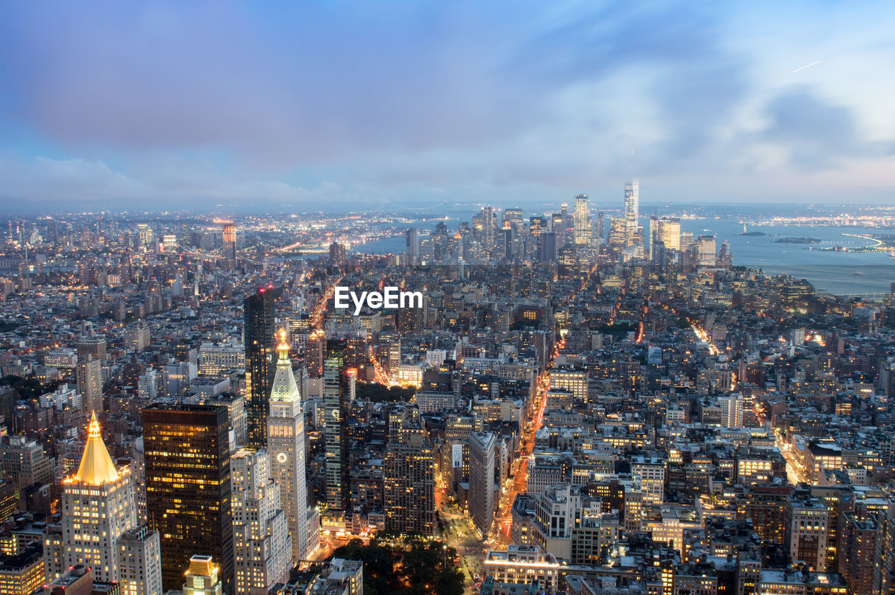 Aerial view of cityscape against sky