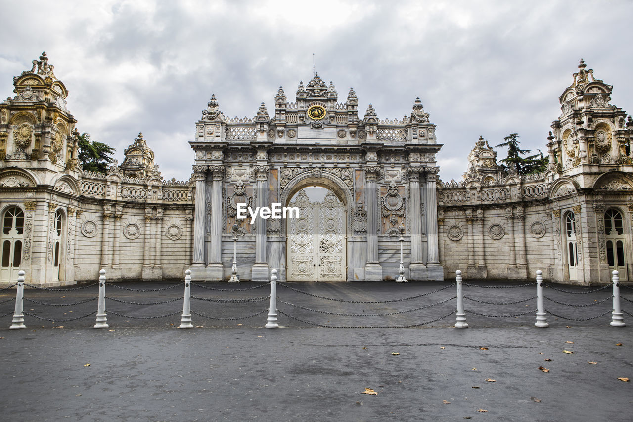 View of historical building against cloudy sky istanbul turkey history palace dolmebace