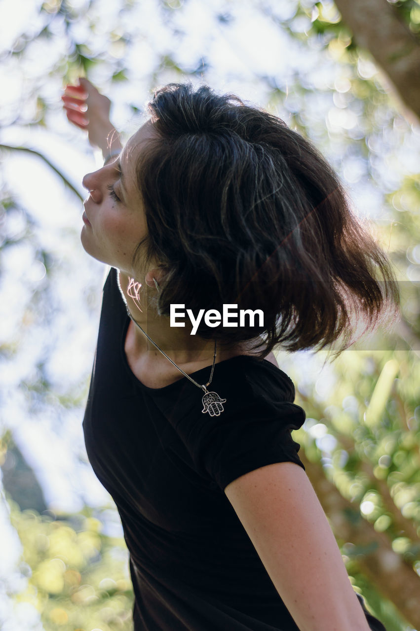 Side view portrait of young woman