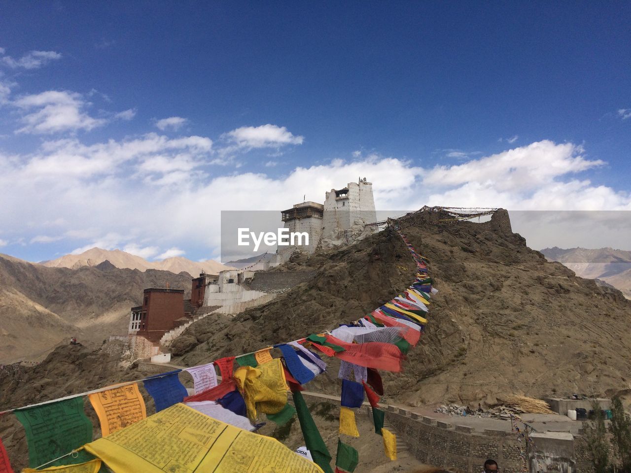 Colorful prayer flags on himalayas against sky