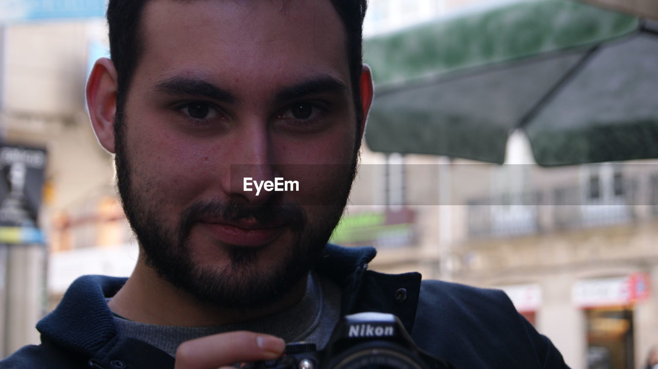 Close-up portrait of smiling man