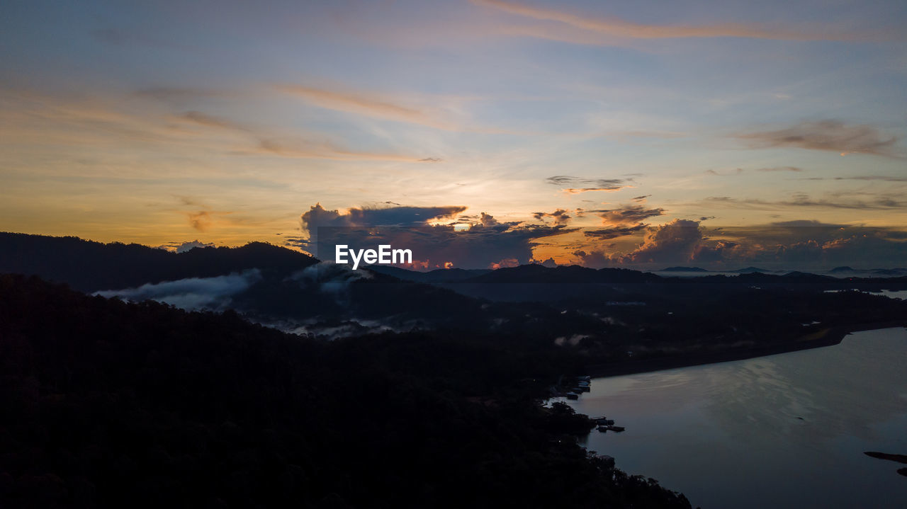 Aerial view of kenyir lake during blue hour sunrise.