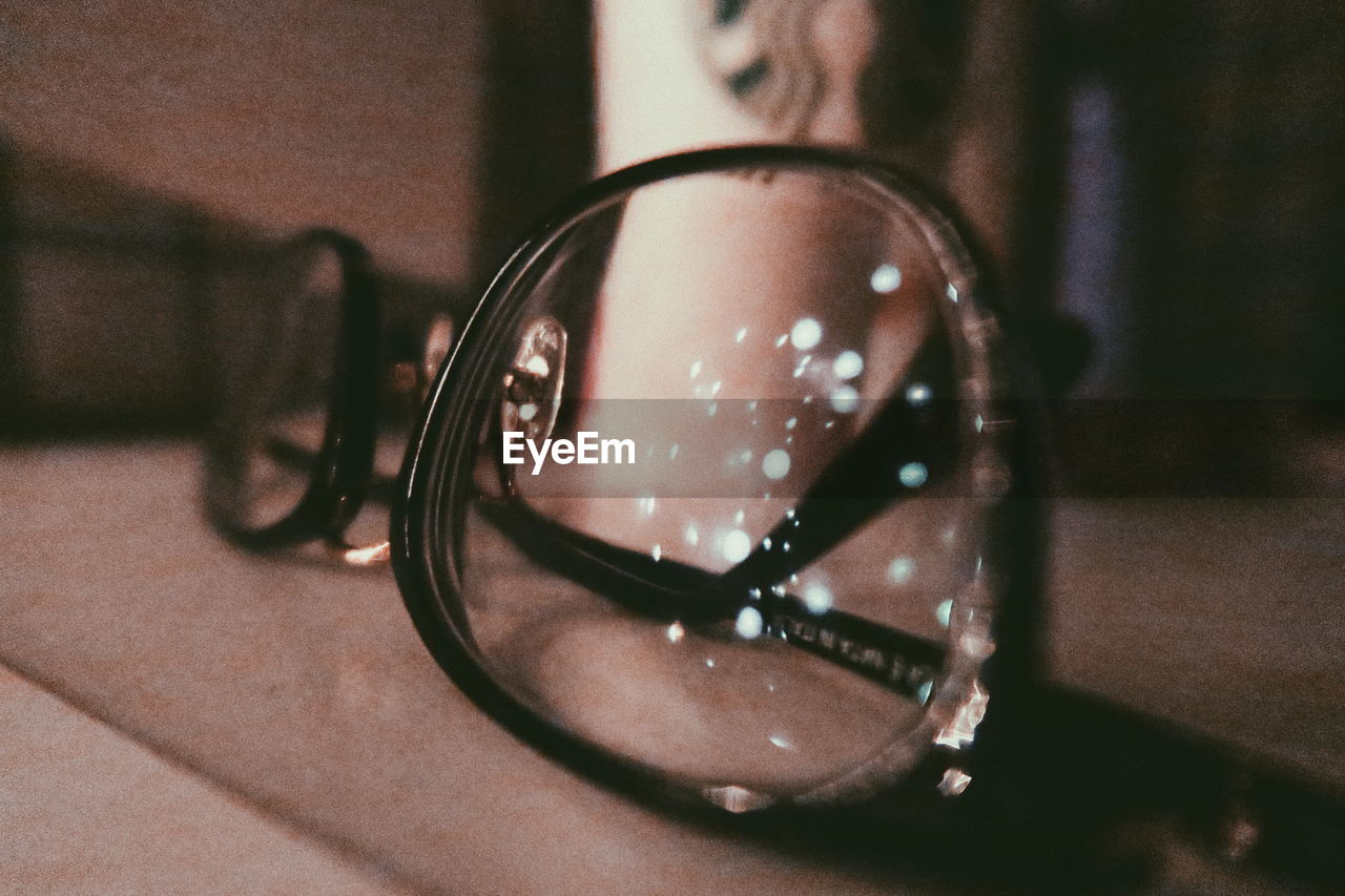 CLOSE-UP OF EYEGLASSES