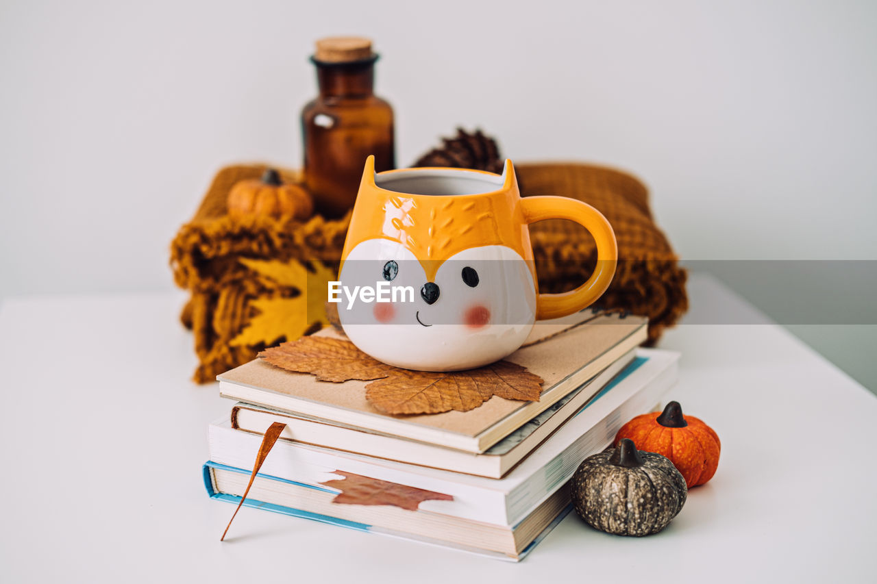 Close-up of fall decorations on table