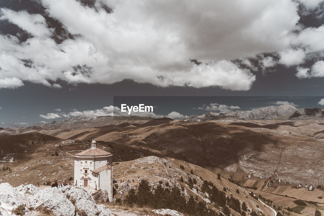 Scenic view of sea against sky, with church