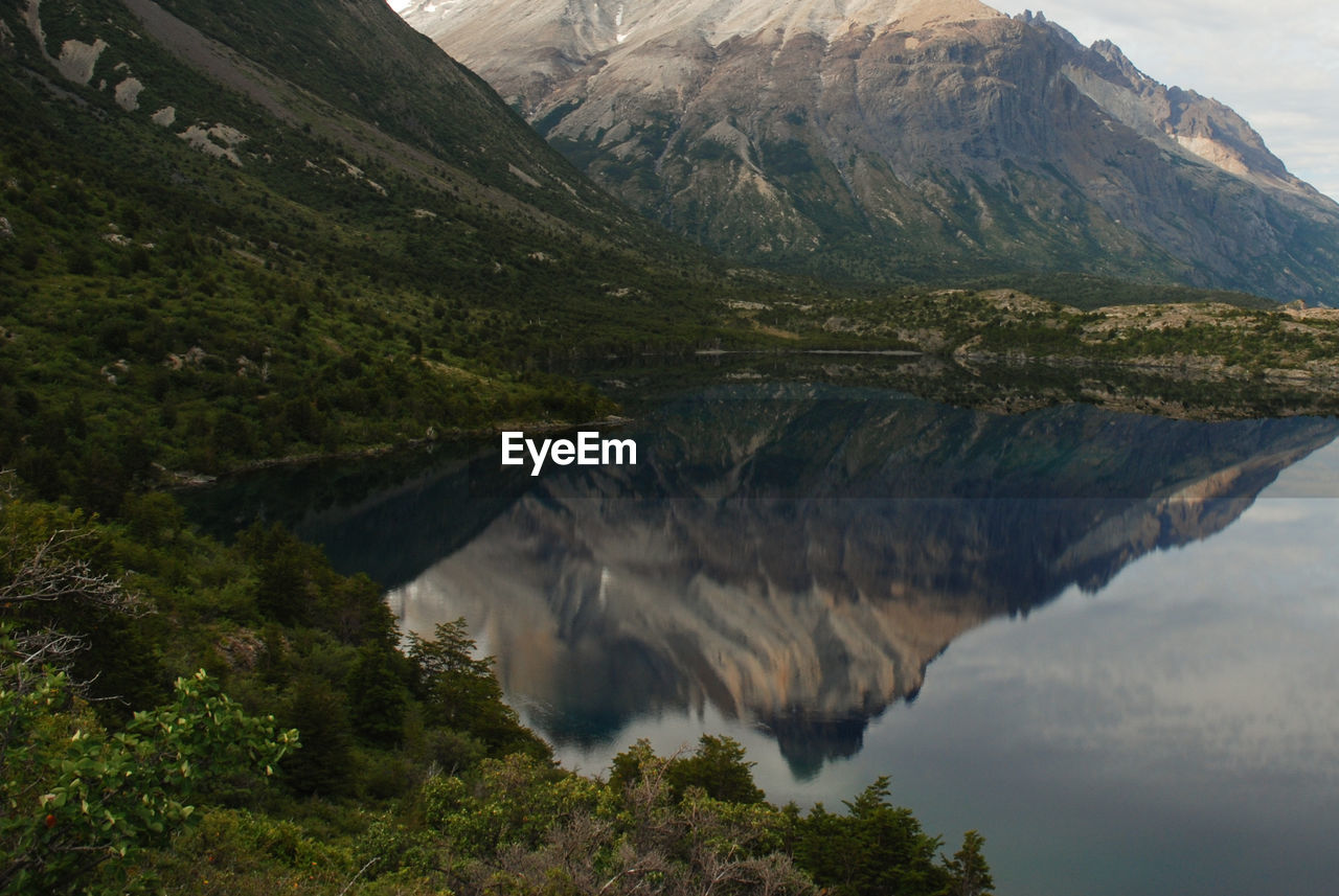 SCENIC VIEW OF LAKE AND MOUNTAINS