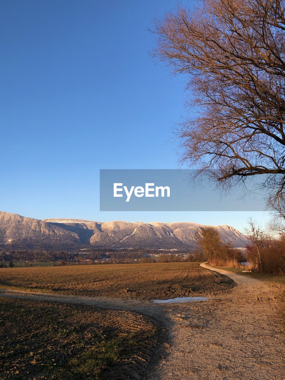 SCENIC VIEW OF LANDSCAPE AGAINST BLUE SKY