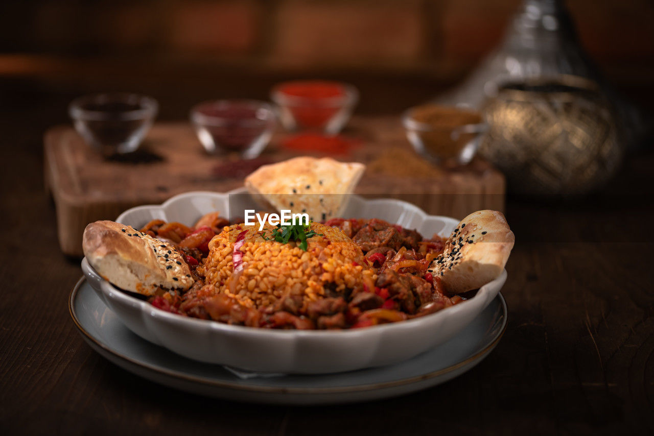 food and drink, food, dish, healthy eating, meal, freshness, no people, vegetable, table, plate, indoors, wellbeing, meat, wood, cuisine, fruit, rustic, breakfast, spice, bowl, studio shot