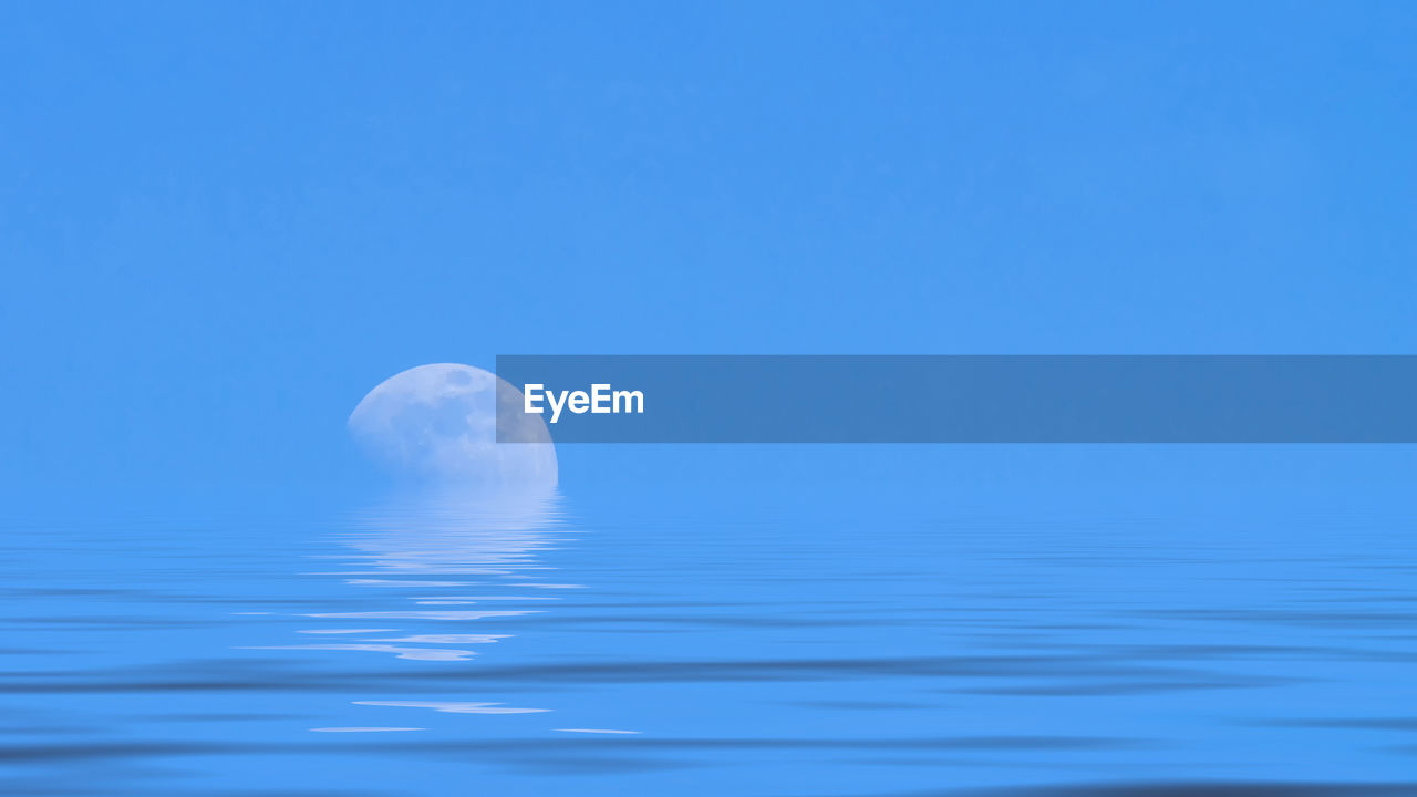 VIEW OF SEA AGAINST BLUE SKY