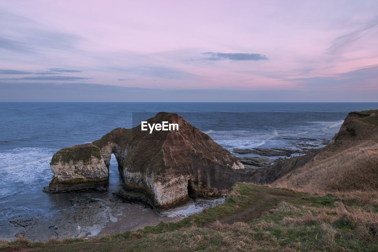 Scenic view of yorkshire coast against sky