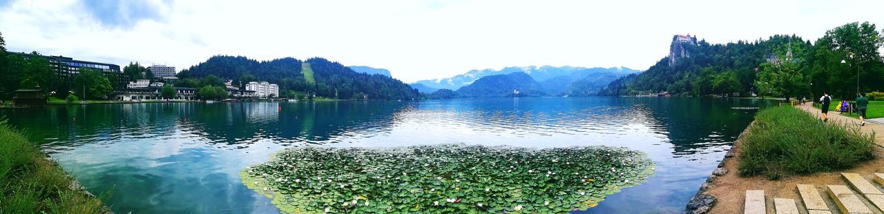 PANORAMIC VIEW OF LAKE AND MOUNTAINS AGAINST SKY