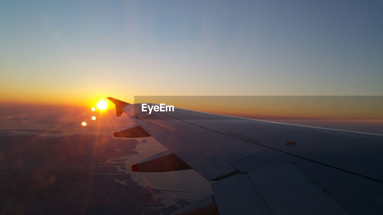 AIRPLANE FLYING IN SKY