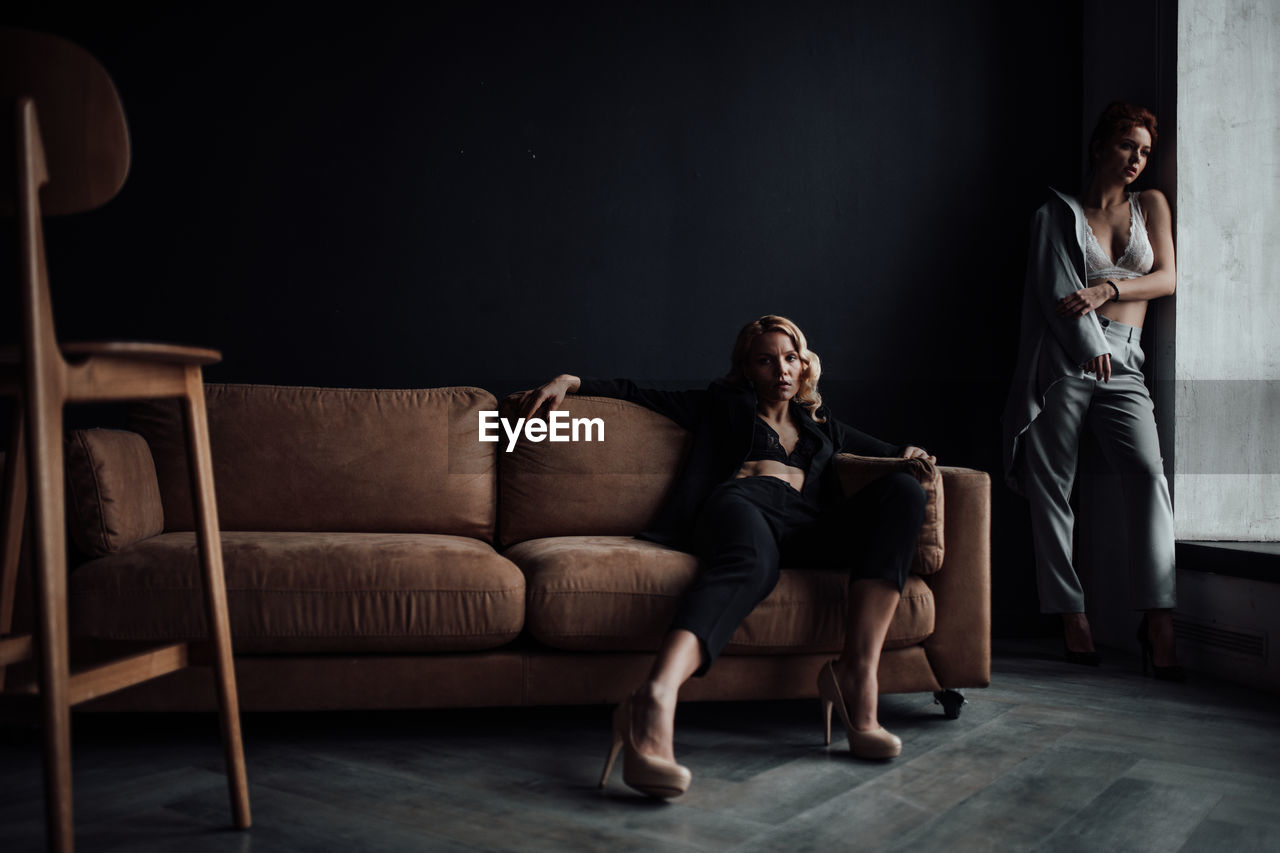 Young couple sitting on sofa